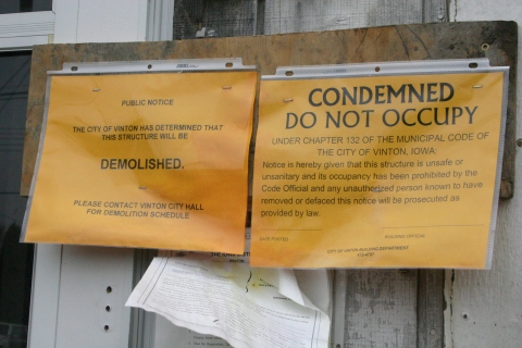 Orange placards have been placed on 16 properties in Vinton, deeming them unsafe and set for demolition.