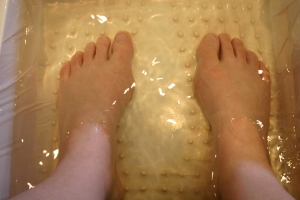 My feet in the nice, clean water before the toxins were pulled out.